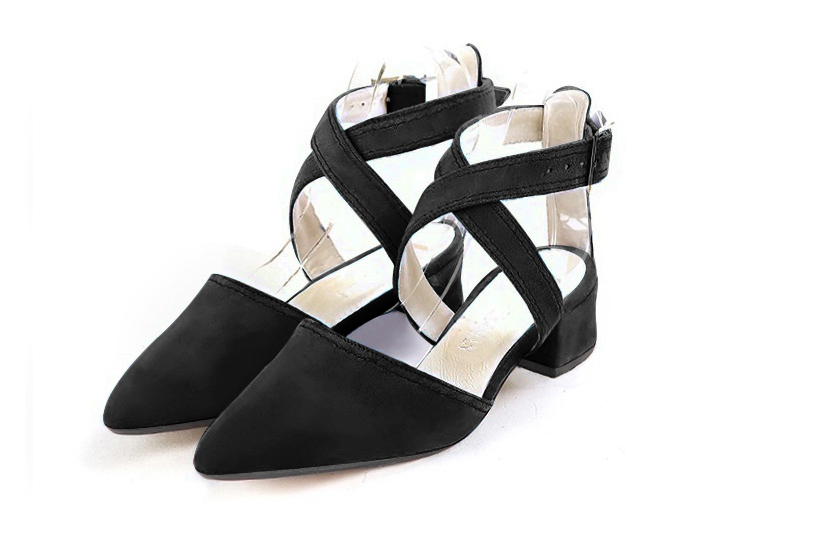 Dress closed-toe heels crossed straps in matt black leather with low flare heels and tapered toe - Front view
